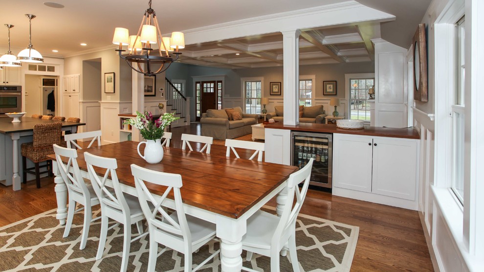 Design ideas for an expansive arts and crafts open plan dining in Other with grey walls and medium hardwood floors.
