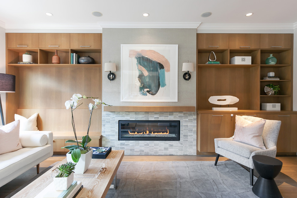 Inspiration for a large contemporary open concept living room in San Francisco with a tile fireplace surround, no tv, grey walls, light hardwood floors and a ribbon fireplace.
