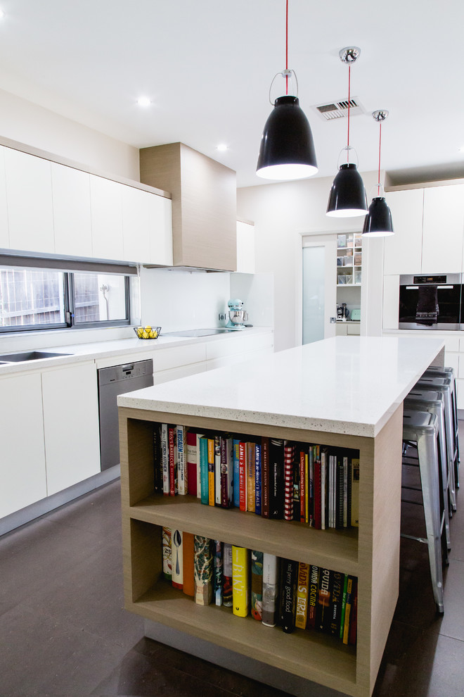 Design ideas for a large contemporary l-shaped kitchen in Canberra - Queanbeyan with a double-bowl sink, flat-panel cabinets, white cabinets, quartz benchtops, white splashback, glass sheet splashback, stainless steel appliances, ceramic floors and with island.