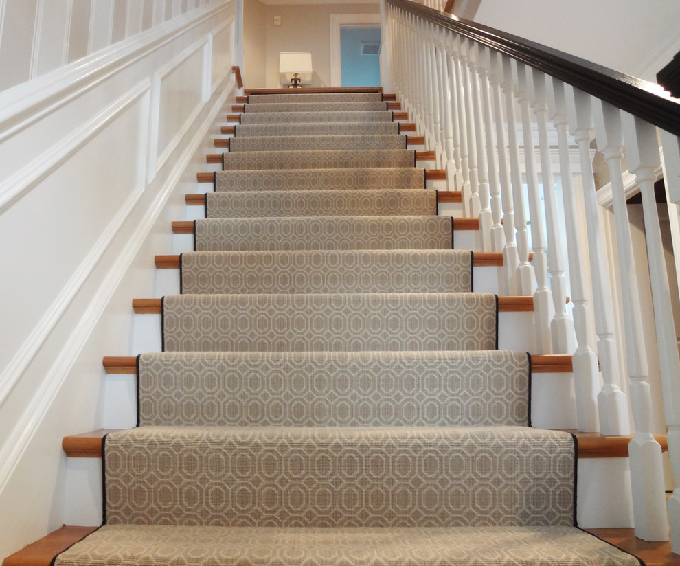 Design ideas for a large transitional carpeted straight staircase in Boston with carpet risers.