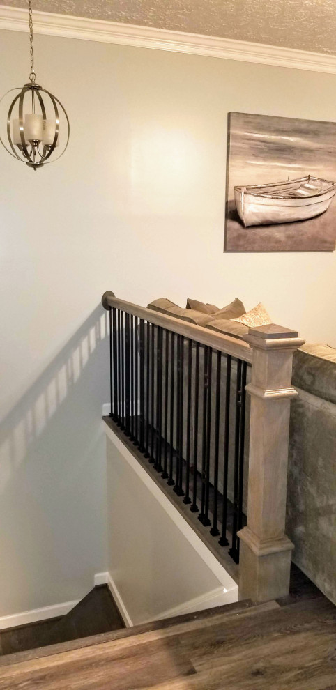 Example of a mid-sized transitional painted l-shaped wood railing staircase design with wooden risers