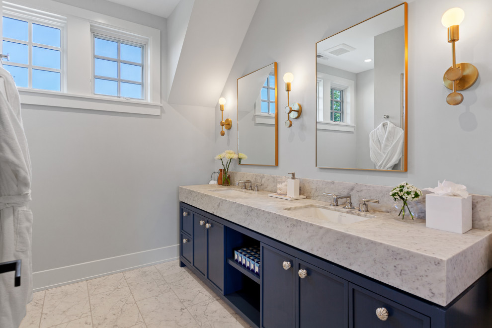 Bathroom - transitional gray floor bathroom idea in Seattle with shaker cabinets, blue cabinets, gray walls, an undermount sink, gray countertops and a built-in vanity