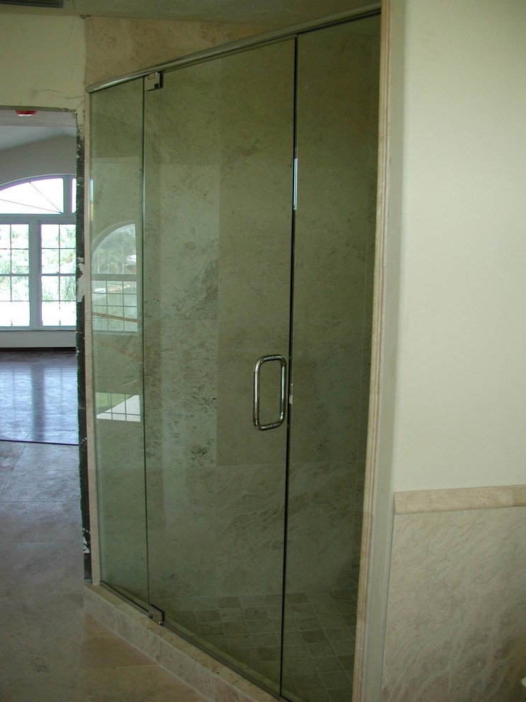 Example of a transitional 3/4 beige tile and ceramic tile ceramic tile and beige floor alcove shower design with beige walls and a hinged shower door