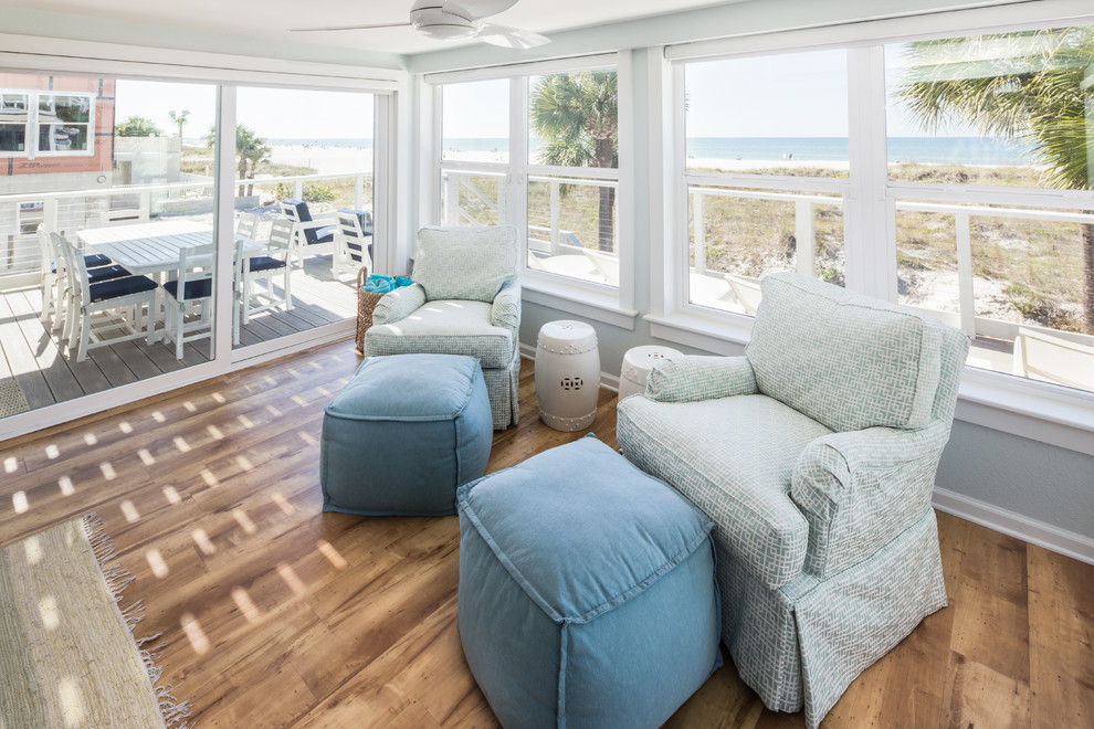 Photo of a beach style sunroom in Tampa.