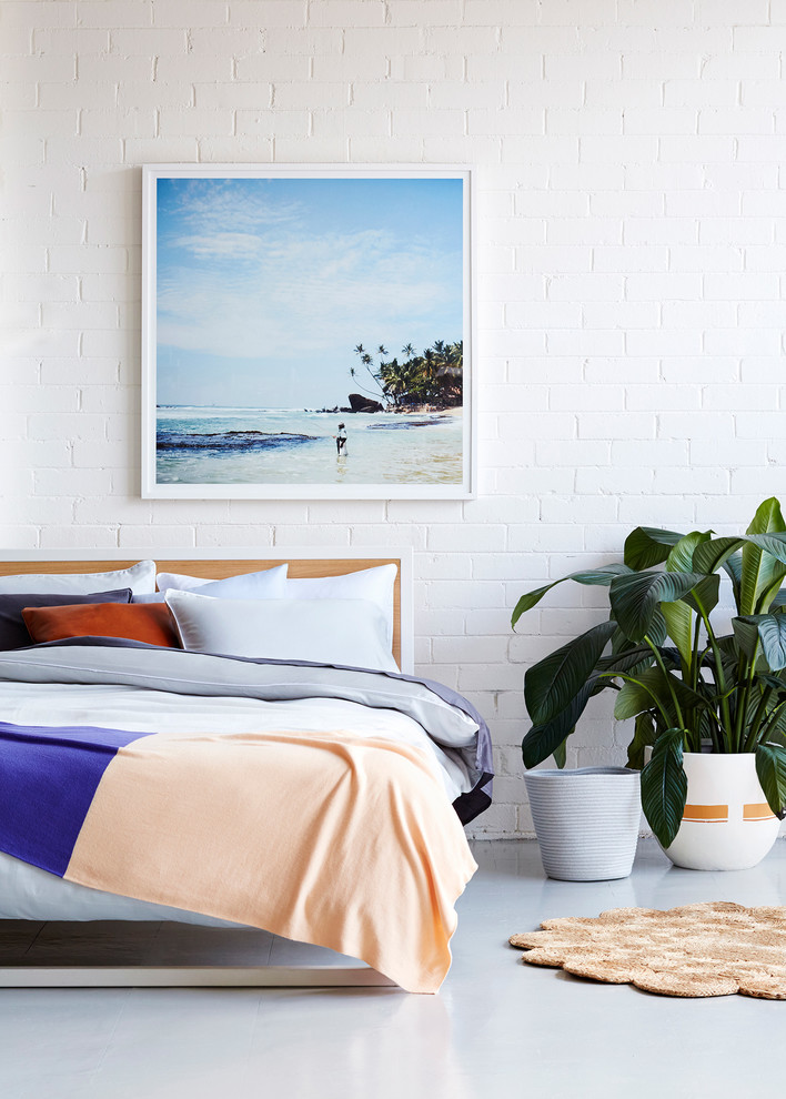 Inspiration for a beach style bedroom in Melbourne.