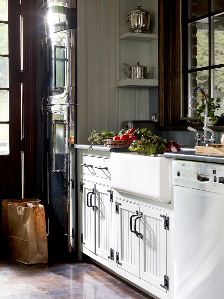 This is an example of a mid-sized traditional galley separate kitchen in New York.