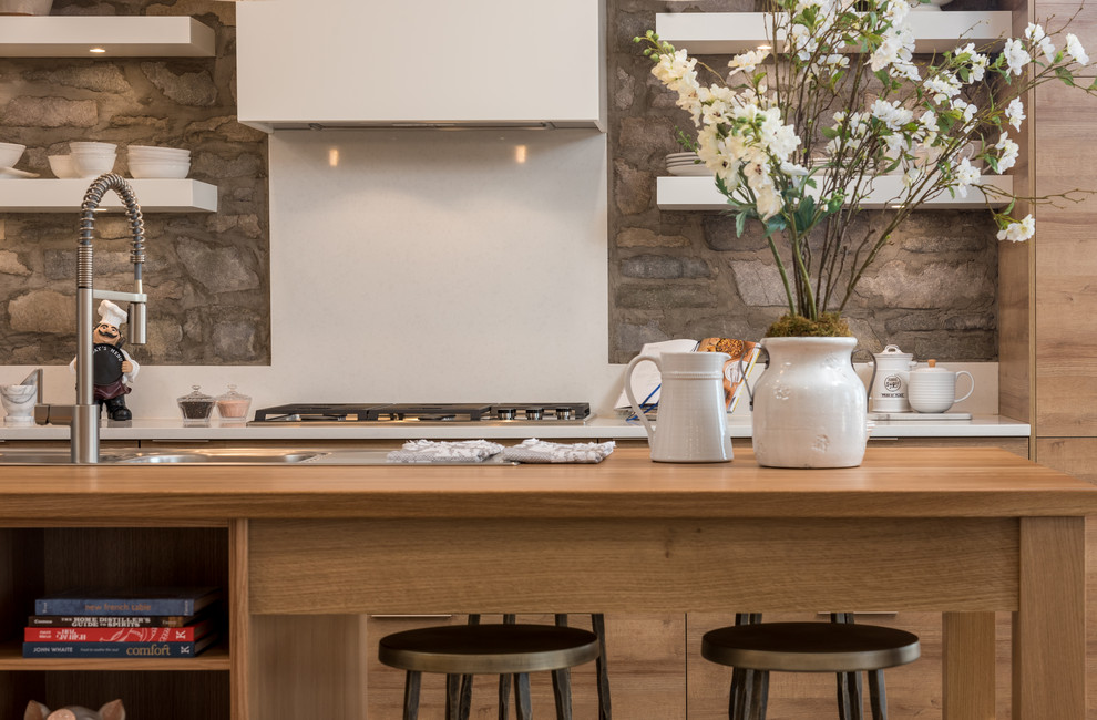 Example of a transitional home design design in Calgary