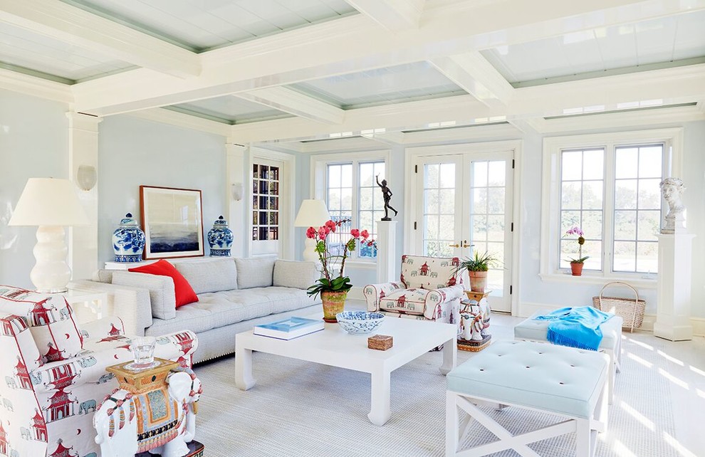 Inspiration for an expansive traditional sunroom with medium hardwood floors and a standard ceiling.