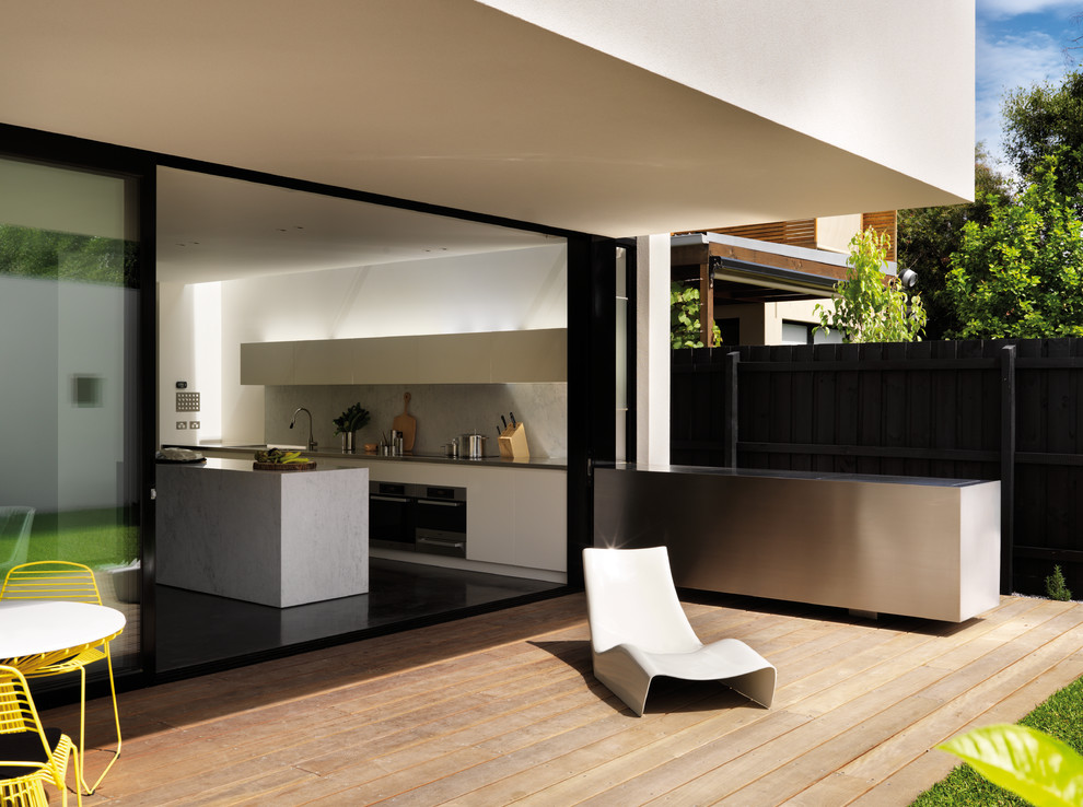This is an example of a contemporary deck in Melbourne.