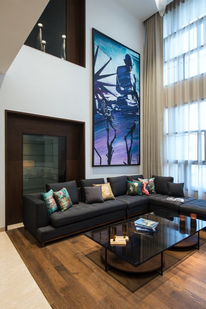 Photo of a contemporary living room in Ahmedabad.