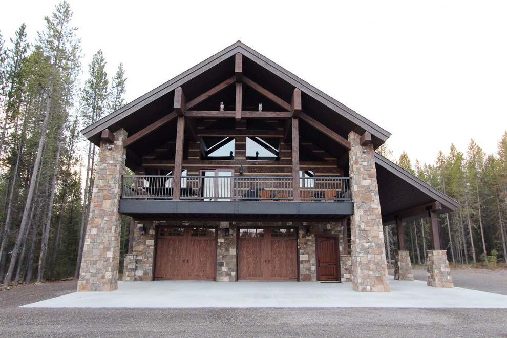 Mountain style two-story concrete brown home design photo