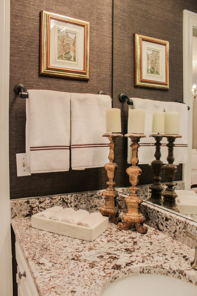 Inspiration for a transitional master white tile and ceramic tile ceramic tile bathroom remodel with white cabinets, brown walls, an undermount sink and granite countertops