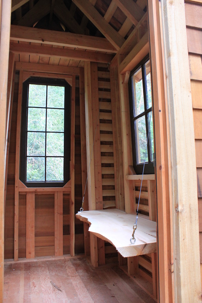 Example of a small mountain style home design design in Seattle