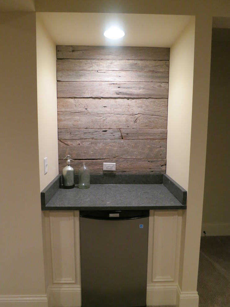 Inspiration for a large rustic look-out carpeted basement remodel in Chicago with no fireplace