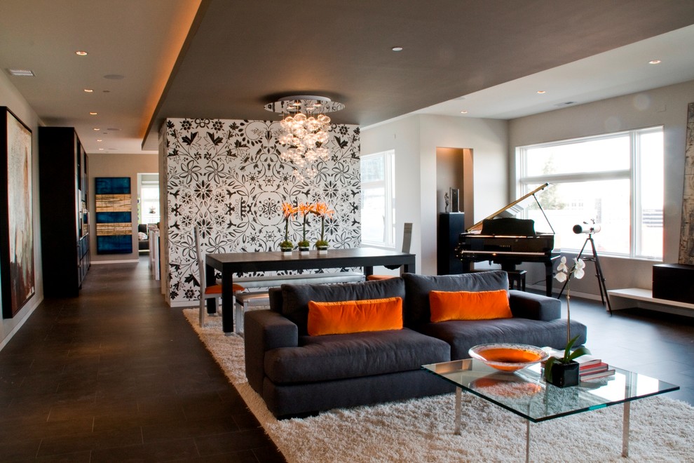 This is an example of a contemporary open concept living room in Indianapolis with a music area.