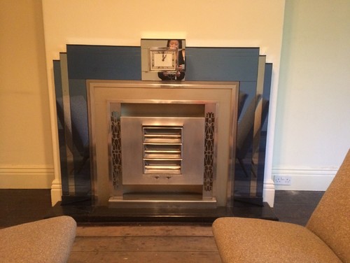 The 100 year old house we have just purchased came with this Art Deco fireplace in the dining room