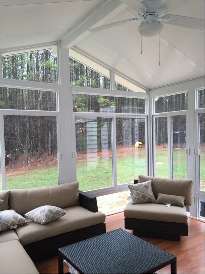 Mid-sized modern sunroom in Richmond with light hardwood floors, no fireplace and a standard ceiling.