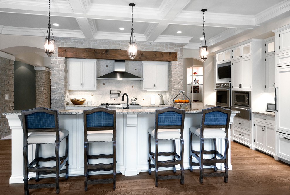 Inspiration for a traditional kitchen in Chicago with beaded inset cabinets, white cabinets, granite benchtops, white splashback and stainless steel appliances.