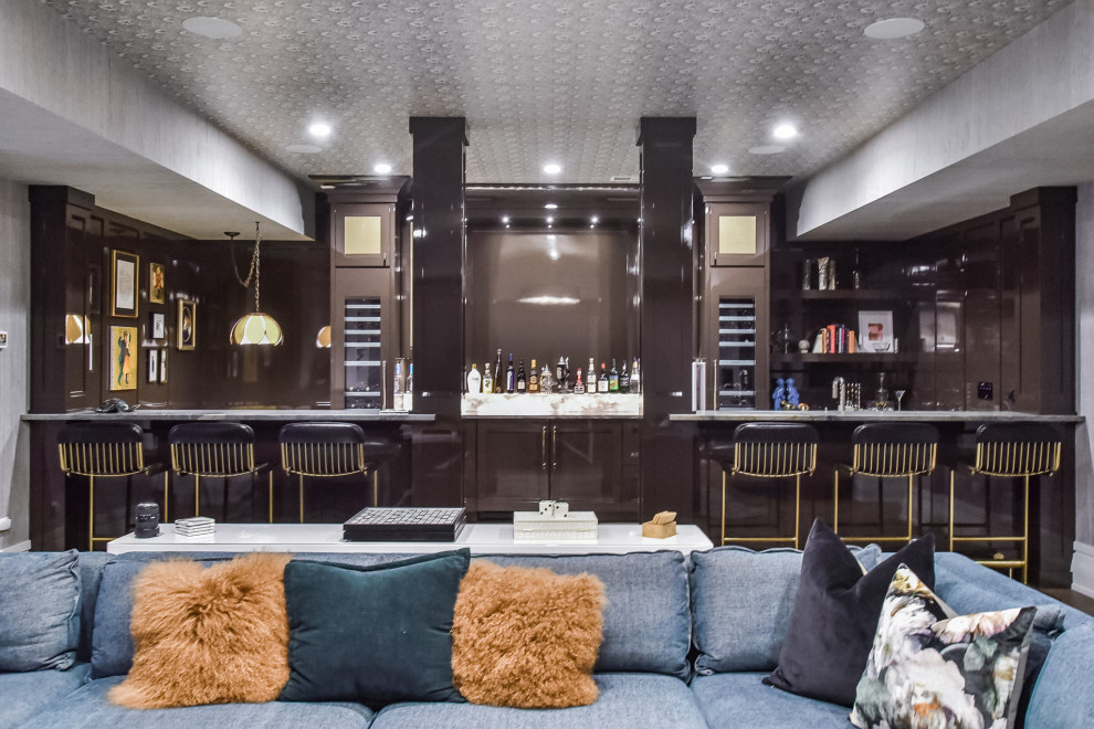 Photo of an expansive eclectic basement in Chicago with a home bar, wallpaper and wallpaper.