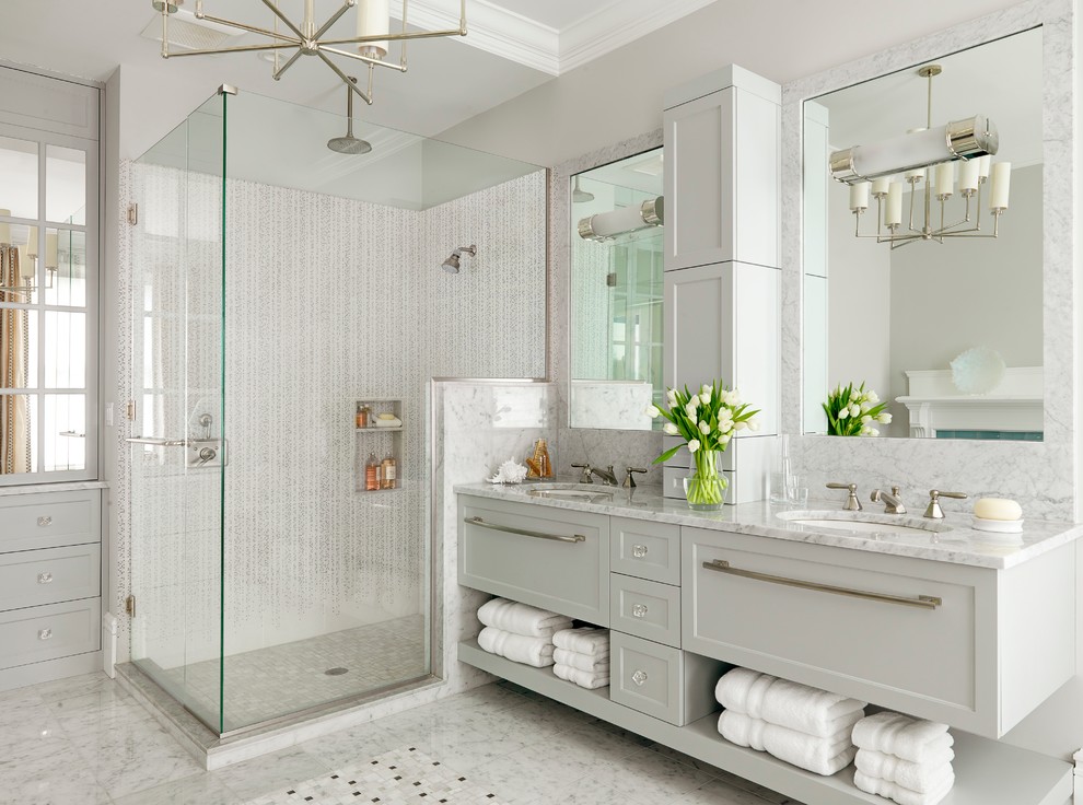 Design ideas for a contemporary bathroom in St Louis with an undermount sink, shaker cabinets, white cabinets, a corner shower, white tile and grey benchtops.