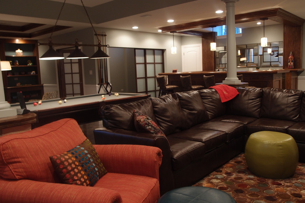 Multi purpose basement bar, pool table, fireplace, tv, workout room