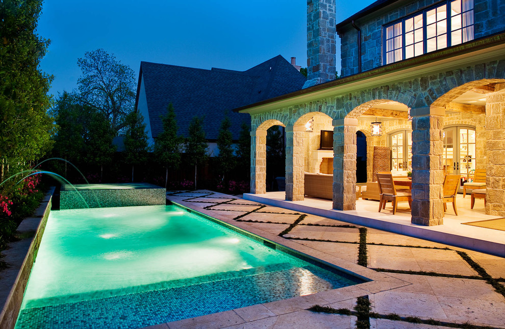 Inspiration for a mid-sized traditional pool in Dallas.