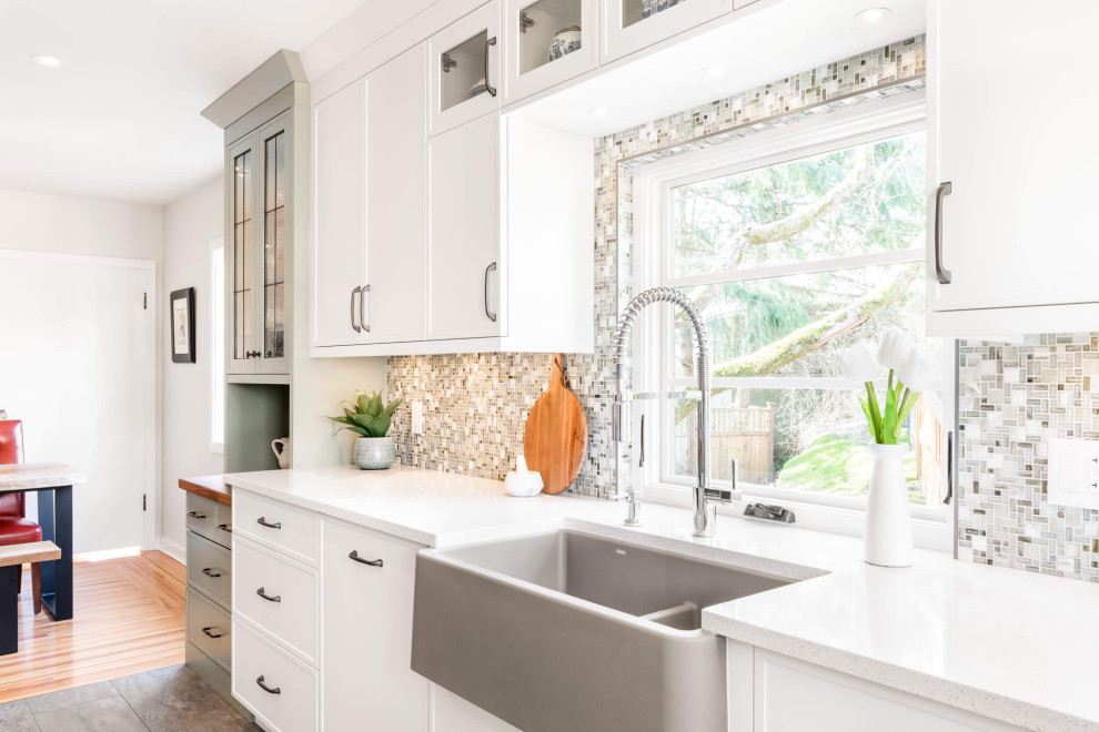 Mid-sized transitional galley eat-in kitchen photo with shaker cabinets and an island