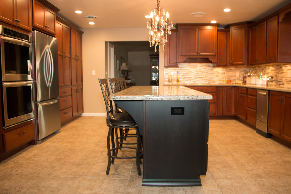 Example of a large transitional u-shaped porcelain tile kitchen design with an undermount sink, flat-panel cabinets, medium tone wood cabinets, quartz countertops, beige backsplash, mosaic tile backsplash, stainless steel appliances and an island