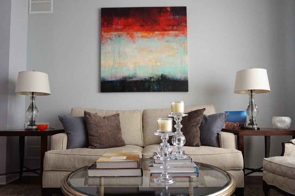 Large eclectic open concept living room in Philadelphia with grey walls, medium hardwood floors and brown floor.