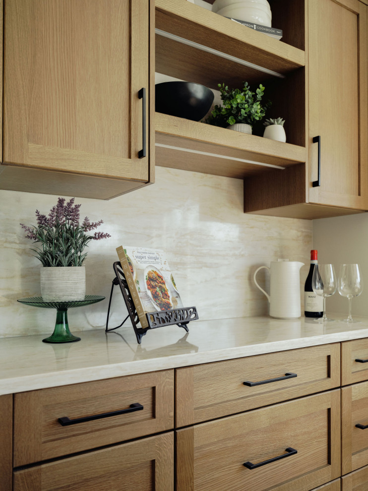 Example of a transitional home design design in Edmonton