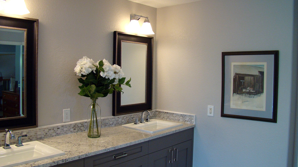 Example of a large transitional master gray tile and mosaic tile bathroom design in Denver with shaker cabinets, gray cabinets and granite countertops