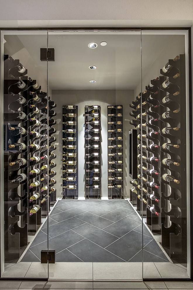 Inspiration for a mid-sized modern wine cellar in Seattle.