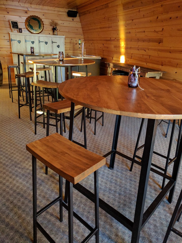 Dining room - rustic dining room idea with brown walls