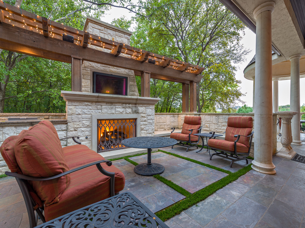 Design ideas for a traditional patio in Dallas with a fire feature.