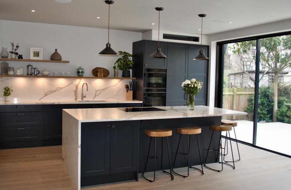 dark grey modern shaker open plan kitchen in family house in the hart ...