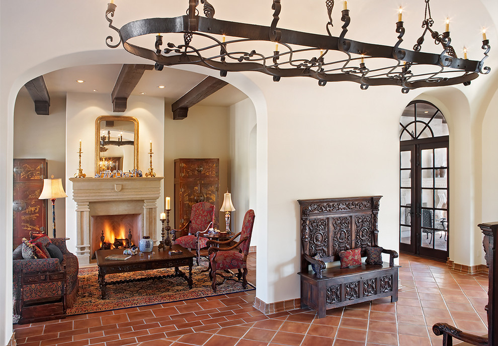 This is an example of a mediterranean enclosed living room in Austin with a standard fireplace.