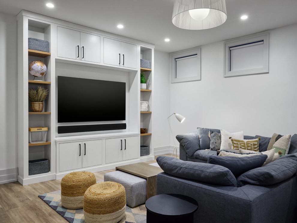 Basement game room - modern look-out basement game room idea in Chicago with white walls
