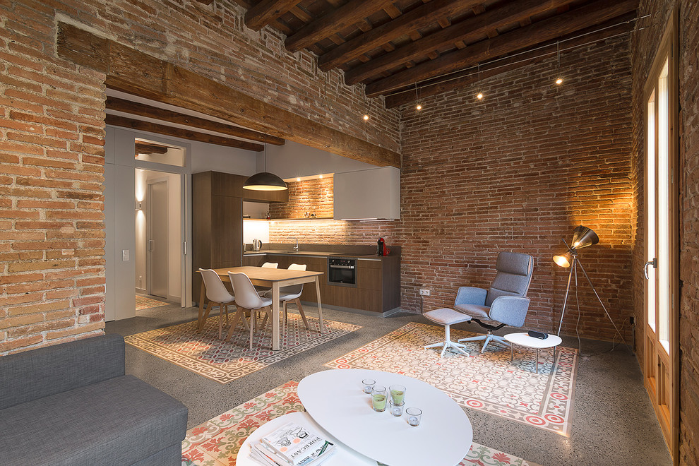 This is an example of a mid-sized industrial formal open concept living room in Barcelona with brown walls, ceramic floors, no fireplace and no tv.