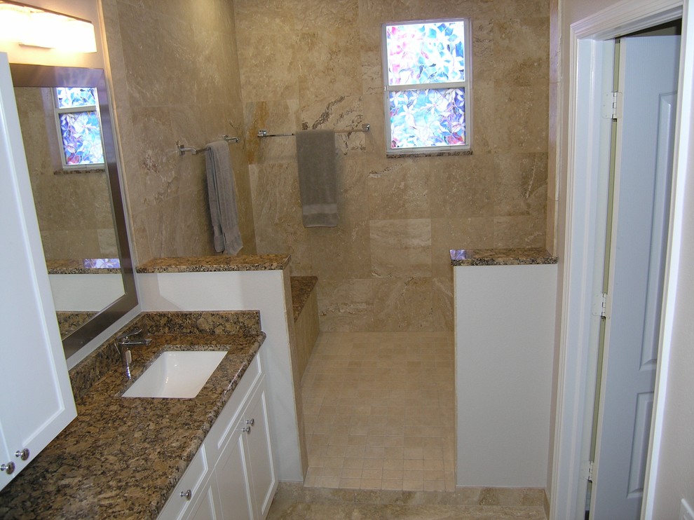 Mid-sized traditional master bathroom in Tampa with shaker cabinets, white cabinets, an alcove tub, an alcove shower, a one-piece toilet, beige tile, beige walls, an undermount sink, granite benchtops, beige floor, travertine, travertine floors and an open shower.