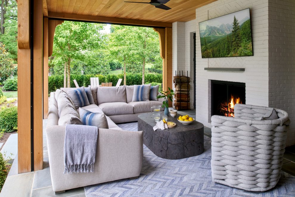 Inspiration for a transitional backyard stone patio remodel in Philadelphia