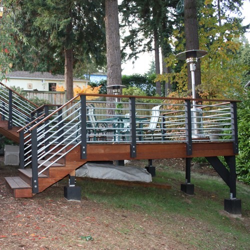 Deck - mid-sized transitional backyard deck idea in Seattle with no cover