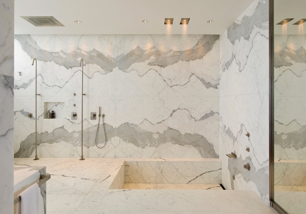 Design ideas for a contemporary bathroom in San Francisco with white tile and stone slab.
