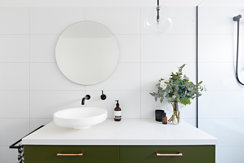Inspiration for a mid-sized modern 3/4 bathroom in Melbourne with green cabinets, an open shower, white tile, white walls, a vessel sink, grey floor, an open shower, white benchtops, furniture-like cabinets, porcelain tile and engineered quartz benchtops.
