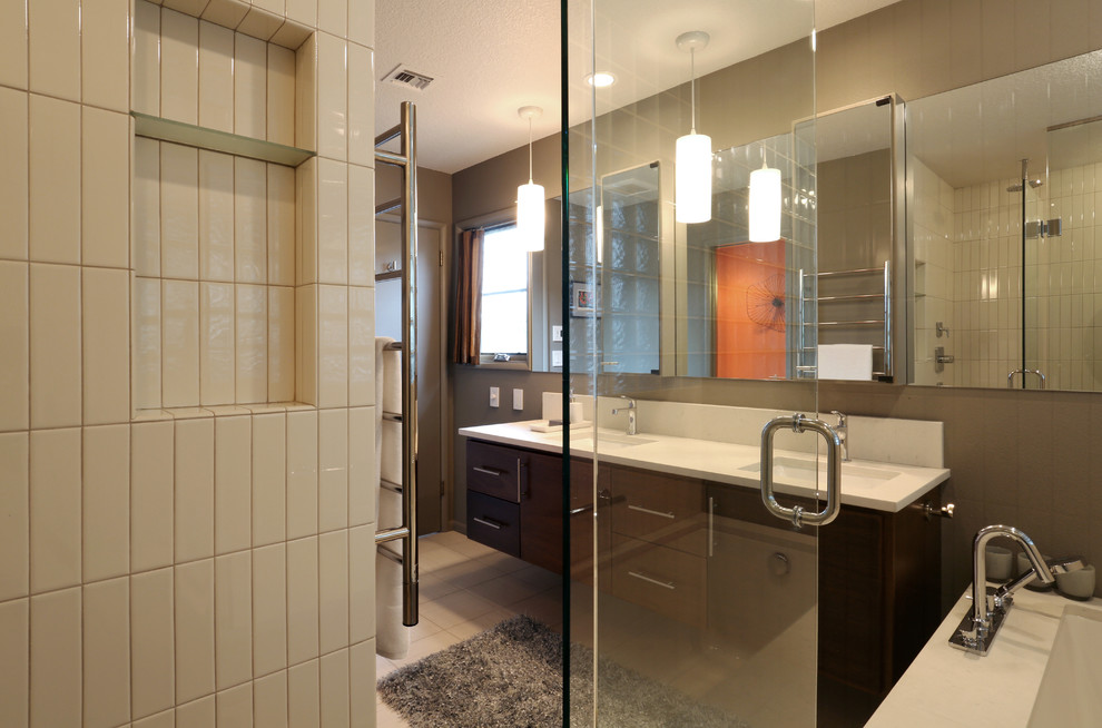 This is an example of a mid-sized midcentury master bathroom in Portland with an undermount sink, flat-panel cabinets, dark wood cabinets and beige tile.