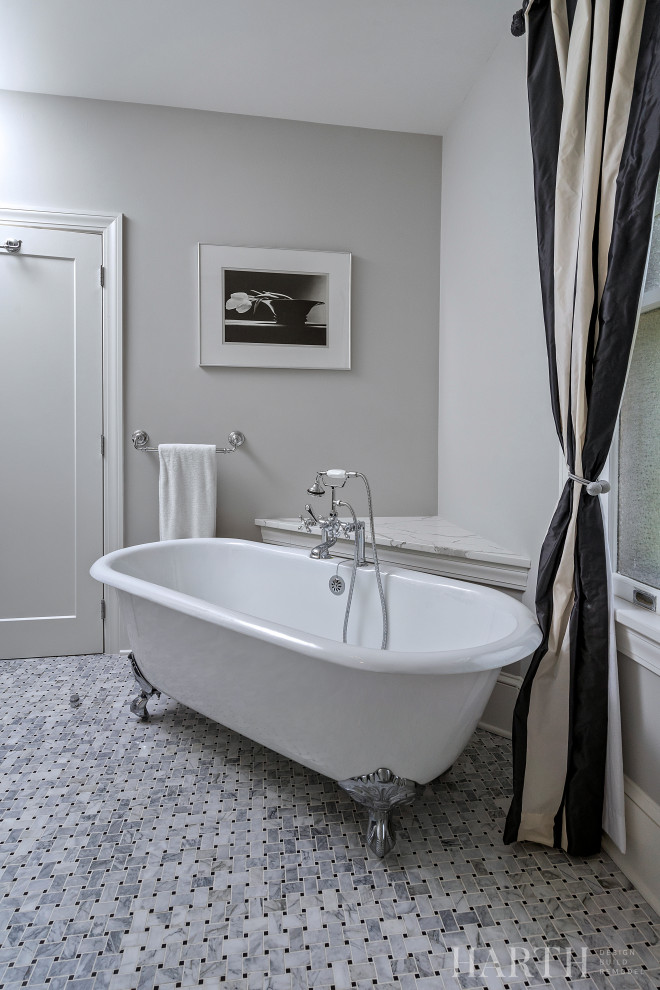 This is an example of a mid-sized transitional master bathroom in Philadelphia with beaded inset cabinets, grey cabinets, a claw-foot tub, a corner shower, a two-piece toilet, white tile, porcelain tile, grey walls, marble floors, an undermount sink, engineered quartz benchtops, multi-coloured floor, a hinged shower door, white benchtops, a shower seat, a single vanity and a built-in vanity.