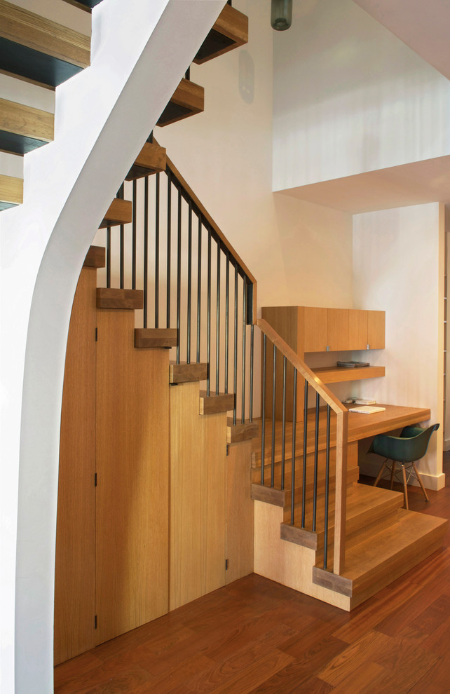 This is an example of a mid-sized contemporary staircase in New York.