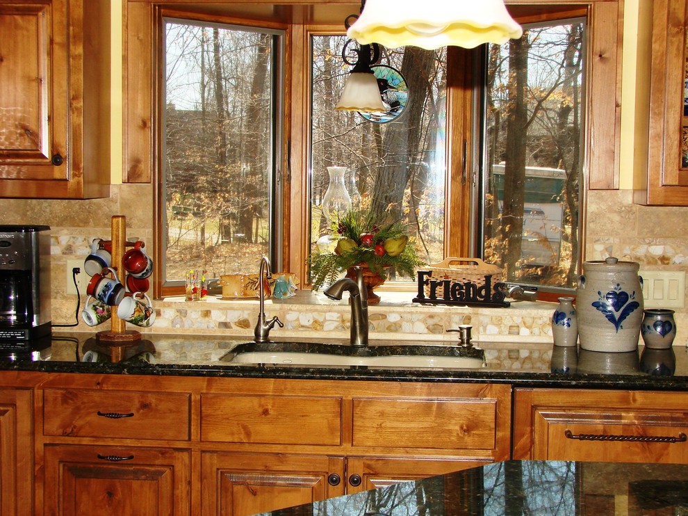 Example of a mountain style kitchen design in Minneapolis