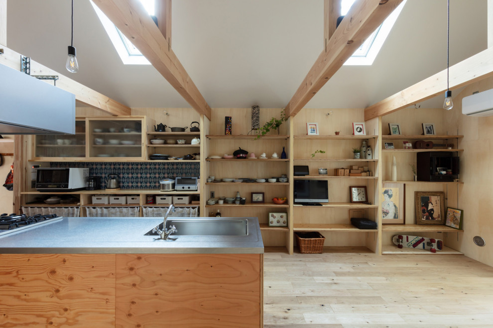 Inspiration for a small industrial galley eat-in kitchen in Osaka with an undermount sink, glass-front cabinets, medium wood cabinets, stainless steel benchtops, grey splashback, ceramic splashback, stainless steel appliances, plywood floors, with island, brown floor, brown benchtop and recessed.