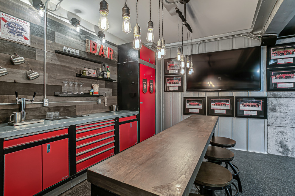 Mid-sized industrial home bar in Calgary with shiplap splashback, cork floors and grey floor.