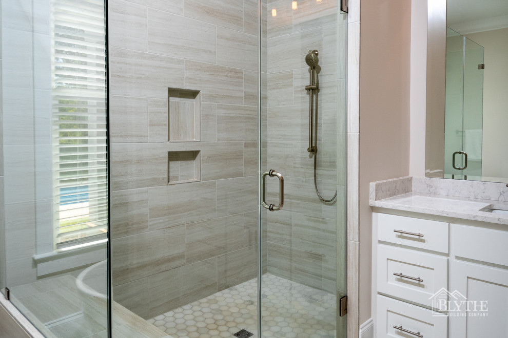 This is an example of a mid-sized country master bathroom in Other with shaker cabinets, white cabinets, a freestanding tub, a corner shower, brown tile, ceramic tile, beige walls, ceramic floors, an undermount sink, brown floor, a hinged shower door, white benchtops, a shower seat, a double vanity and a built-in vanity.